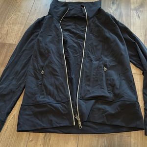 Lululemon black jacket with gold hardware never worn size 12